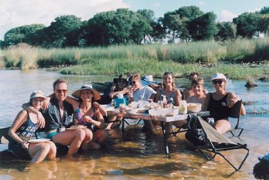 Overlanders enjoying lunch in the Okavango Delta